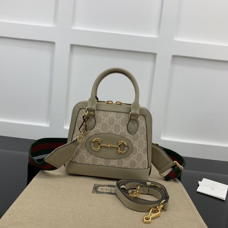 G*u*i top handle bags